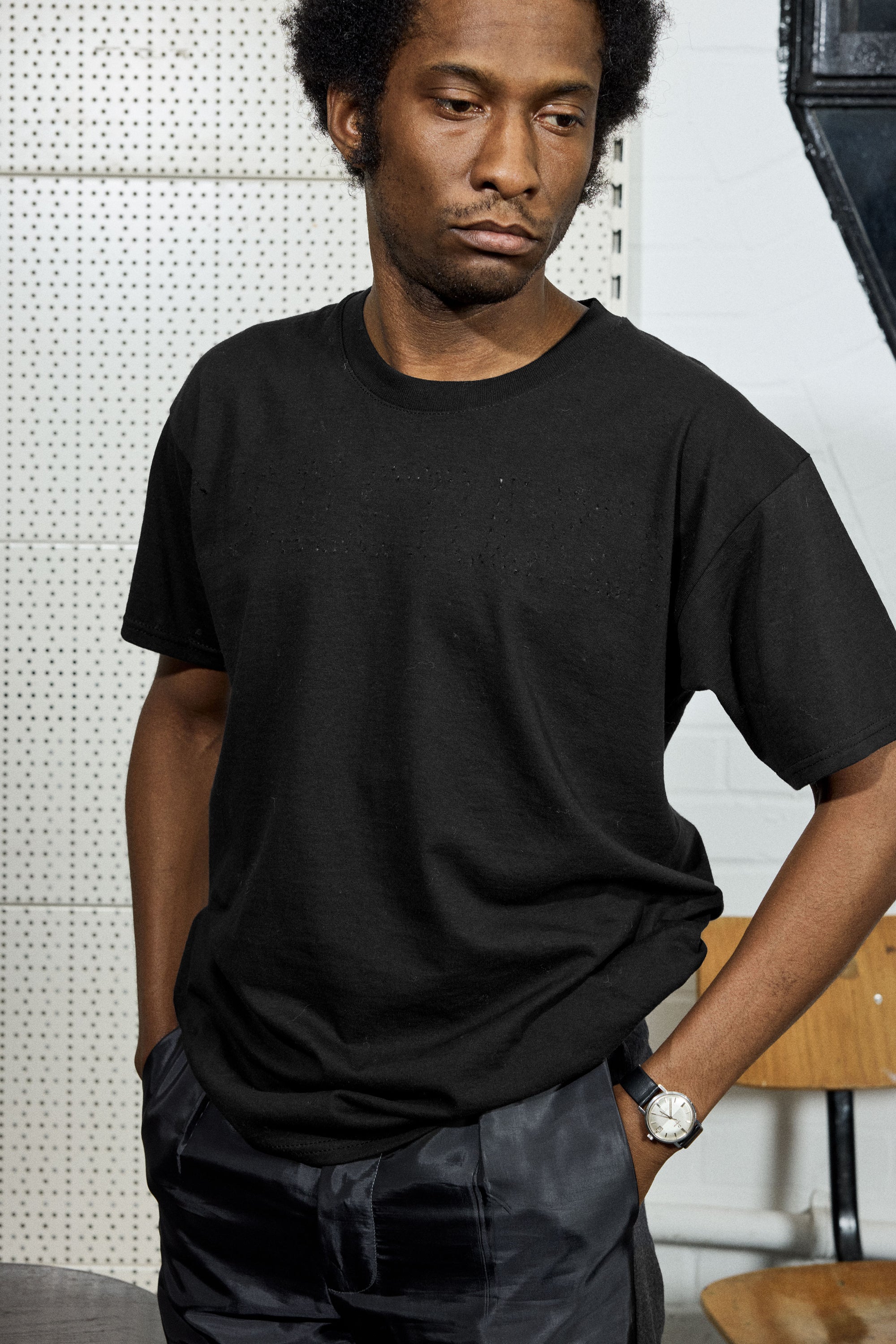 PERFORATED TEE IN BLACK